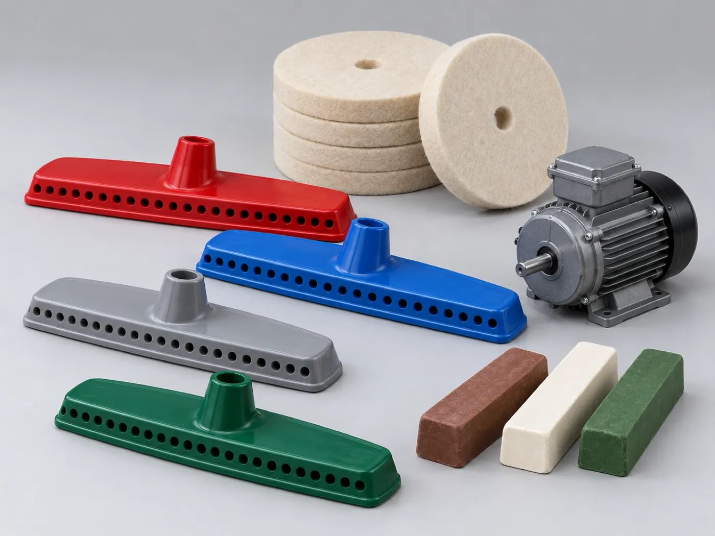 Plastic broom head profiles, polishing felt discs, polishing compound bars and an electric motor