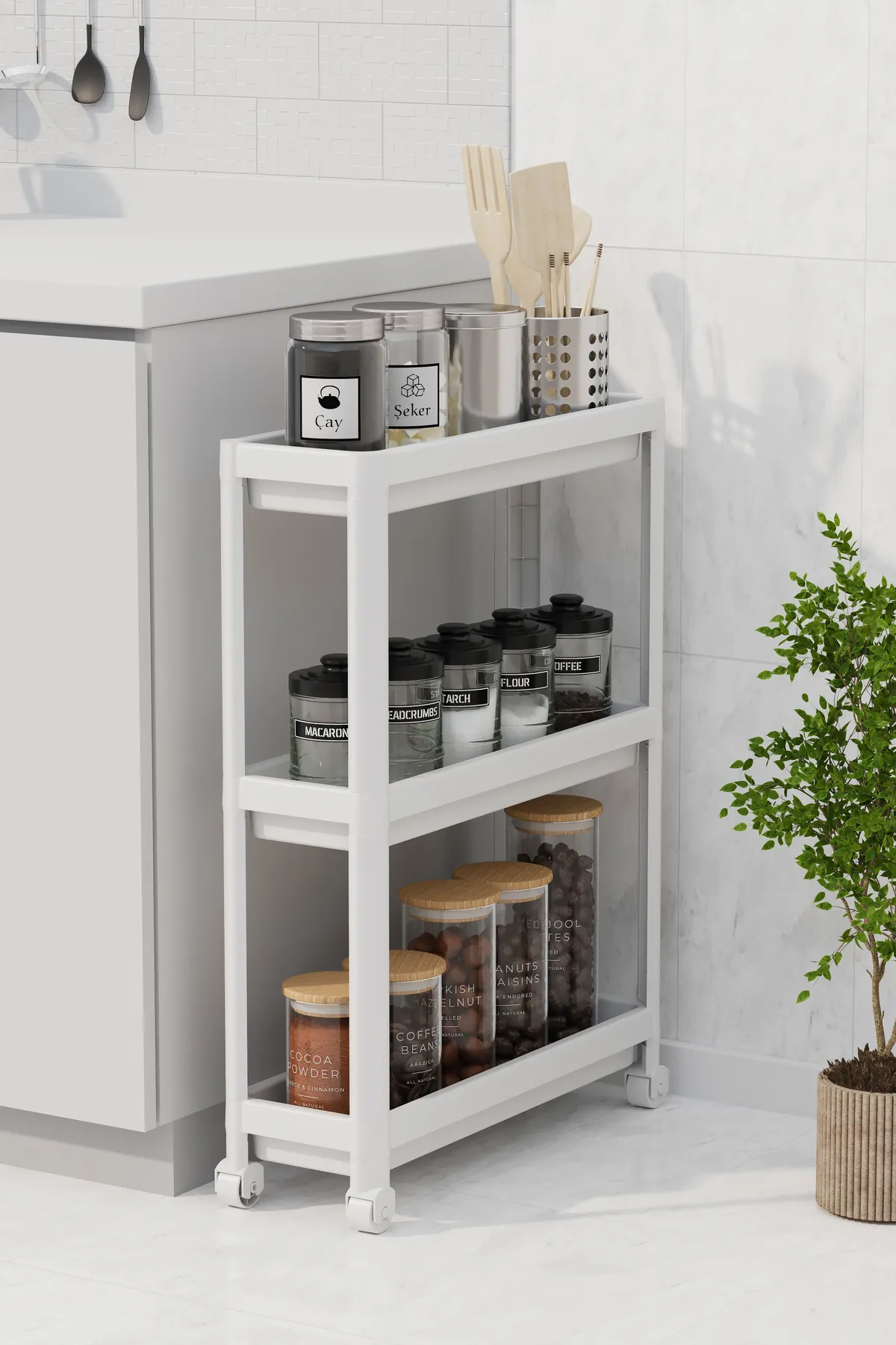Slim white rolling cart beside a kitchen counter