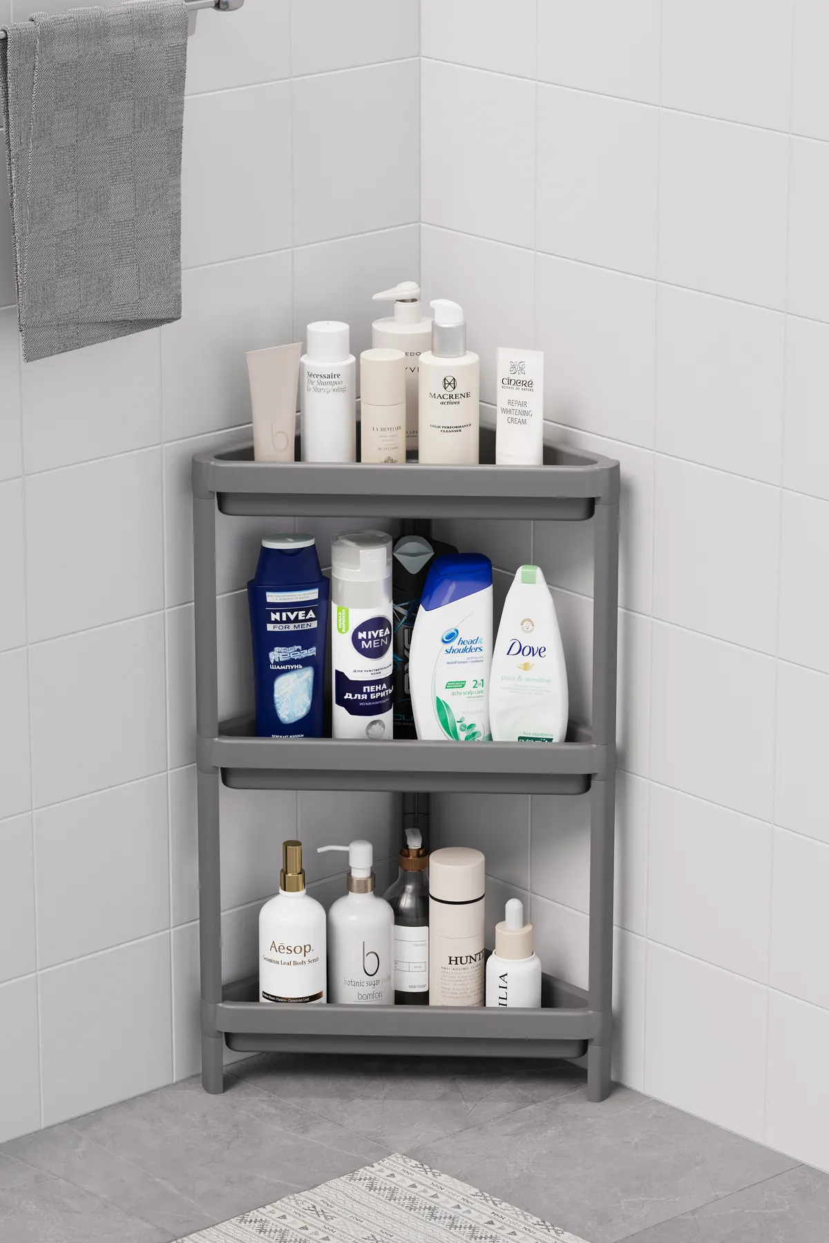Grey triangular corner shelf in a bathroom