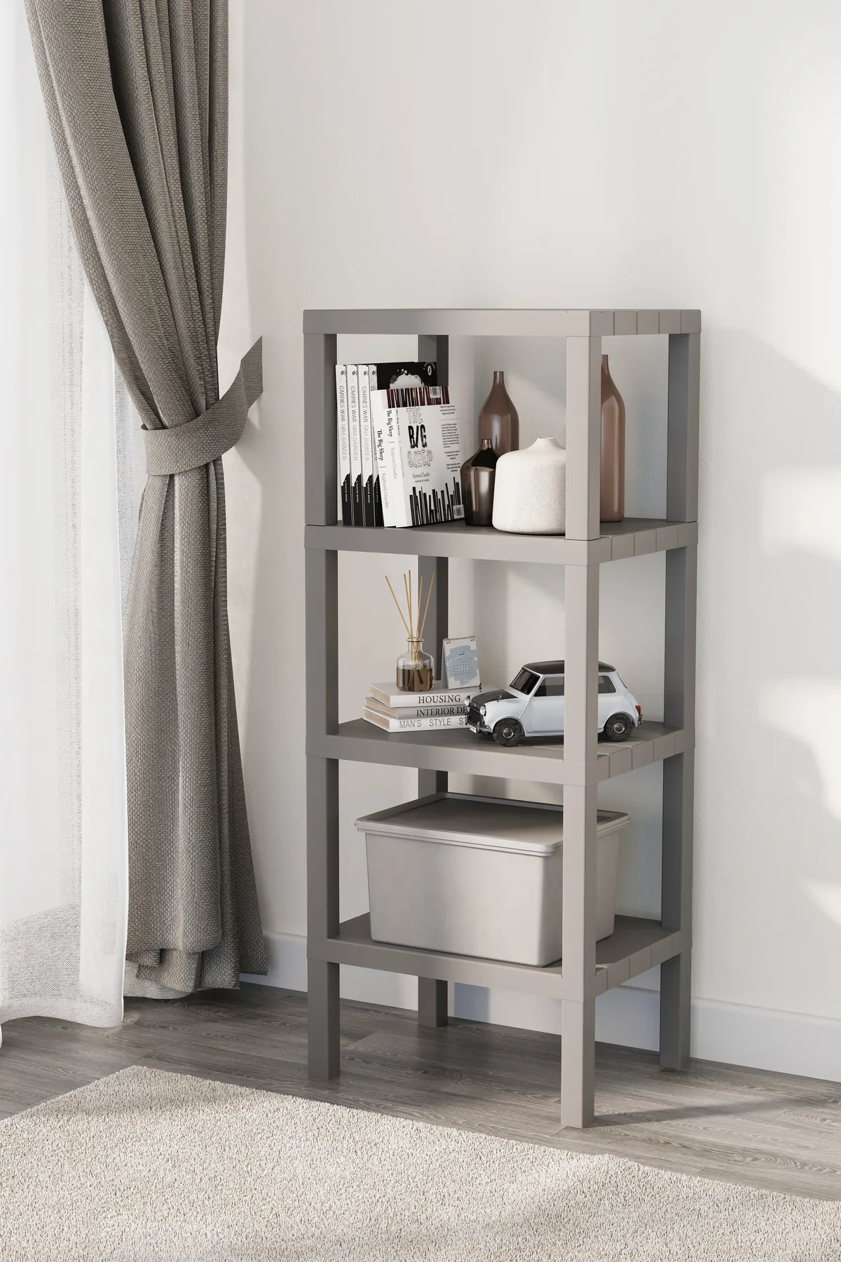 Grey 3-tier shelving unit with a storage box on the bottom shelf
