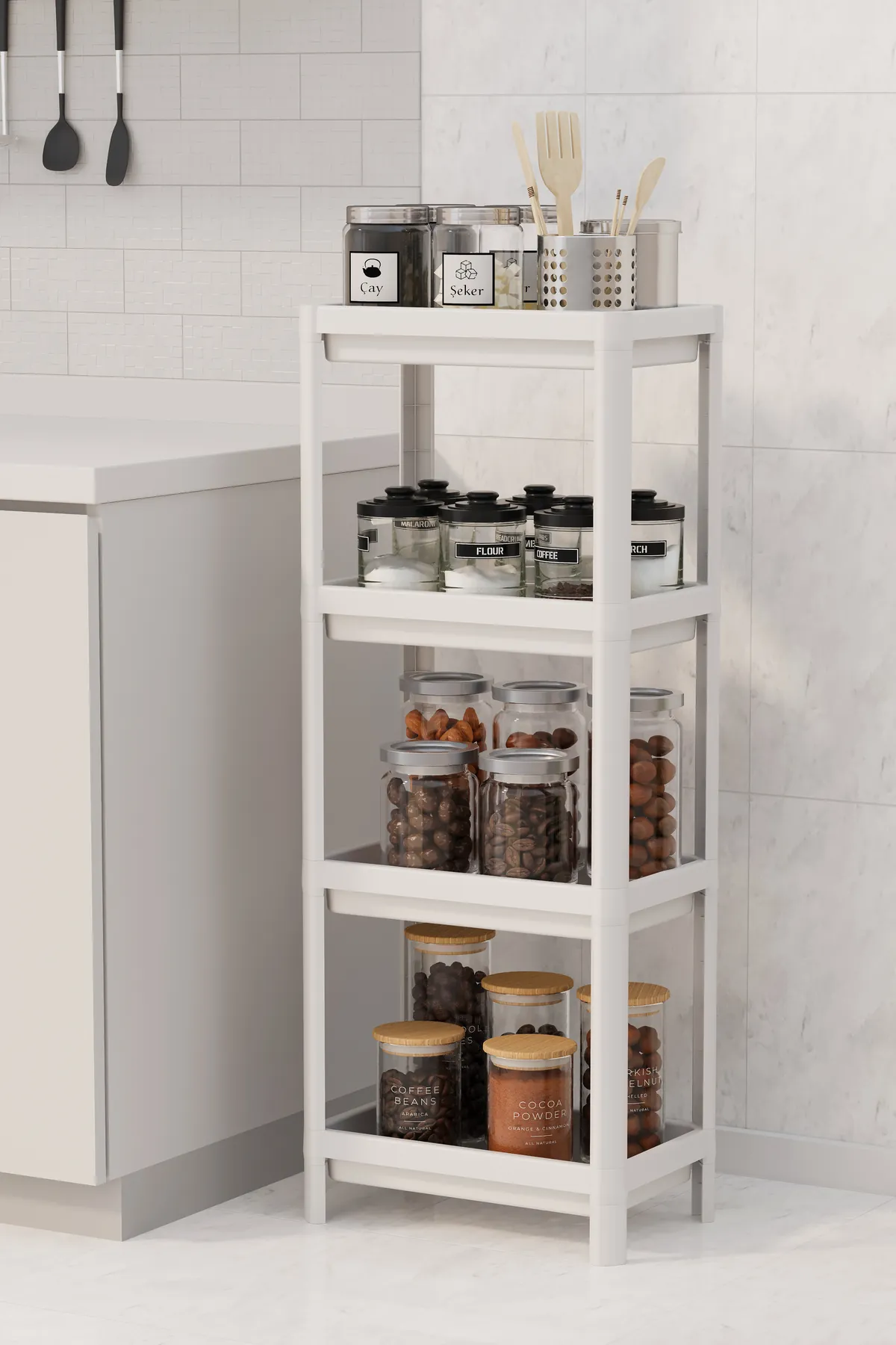 White 4-tier shelving unit with storage jars in a kitchen