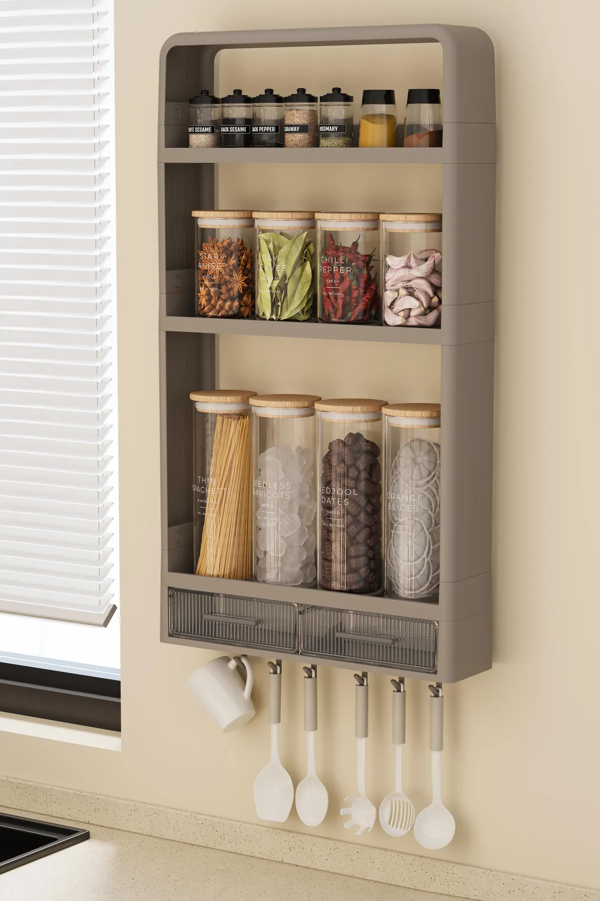TERA wall organiser on a kitchen wall with spice jars and hooks